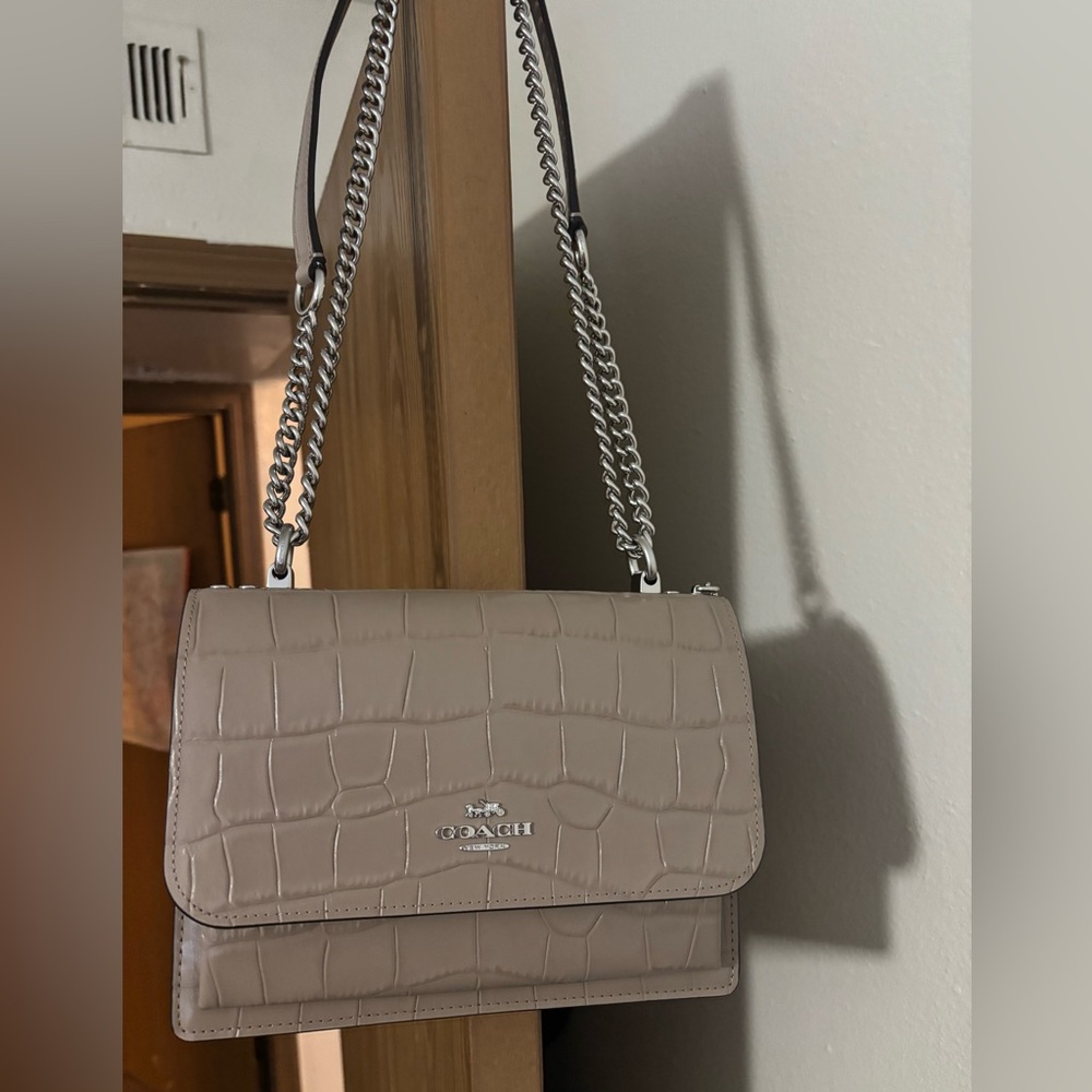 Brand new Coach Klare Crossbody Bag
Embossed Croc/Stone/Silver Hardware